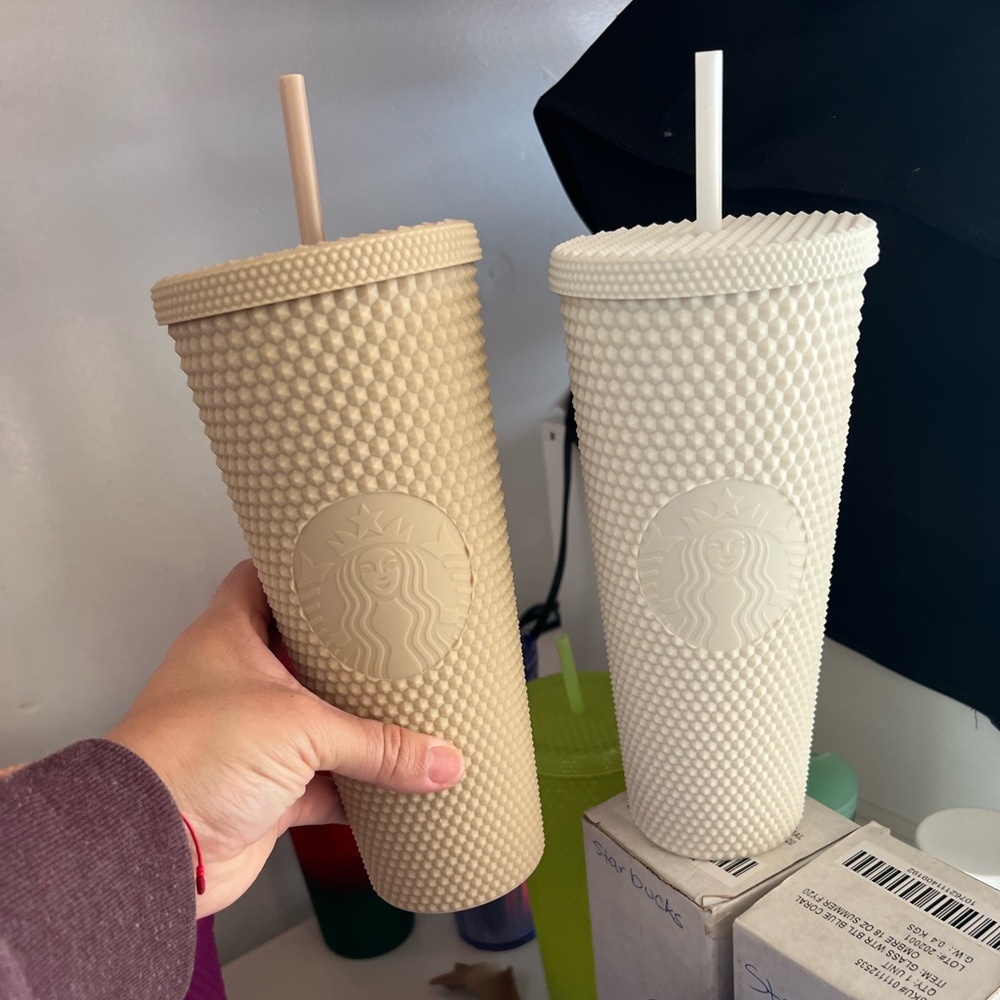 Nude color and white studded Starbucks Tummy sold as a set.